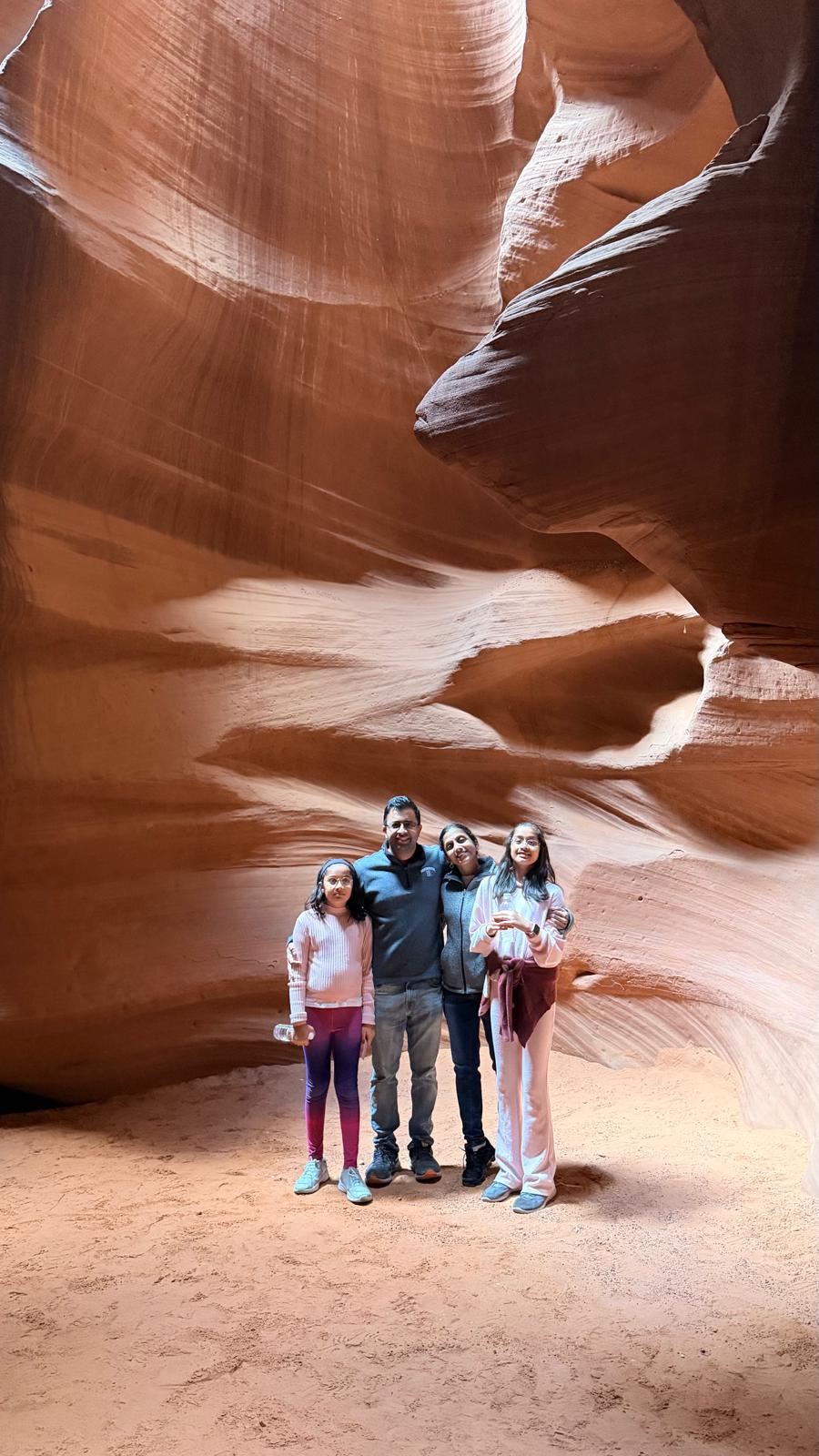 Dr. Golla with her family visiting a sandstone canyon